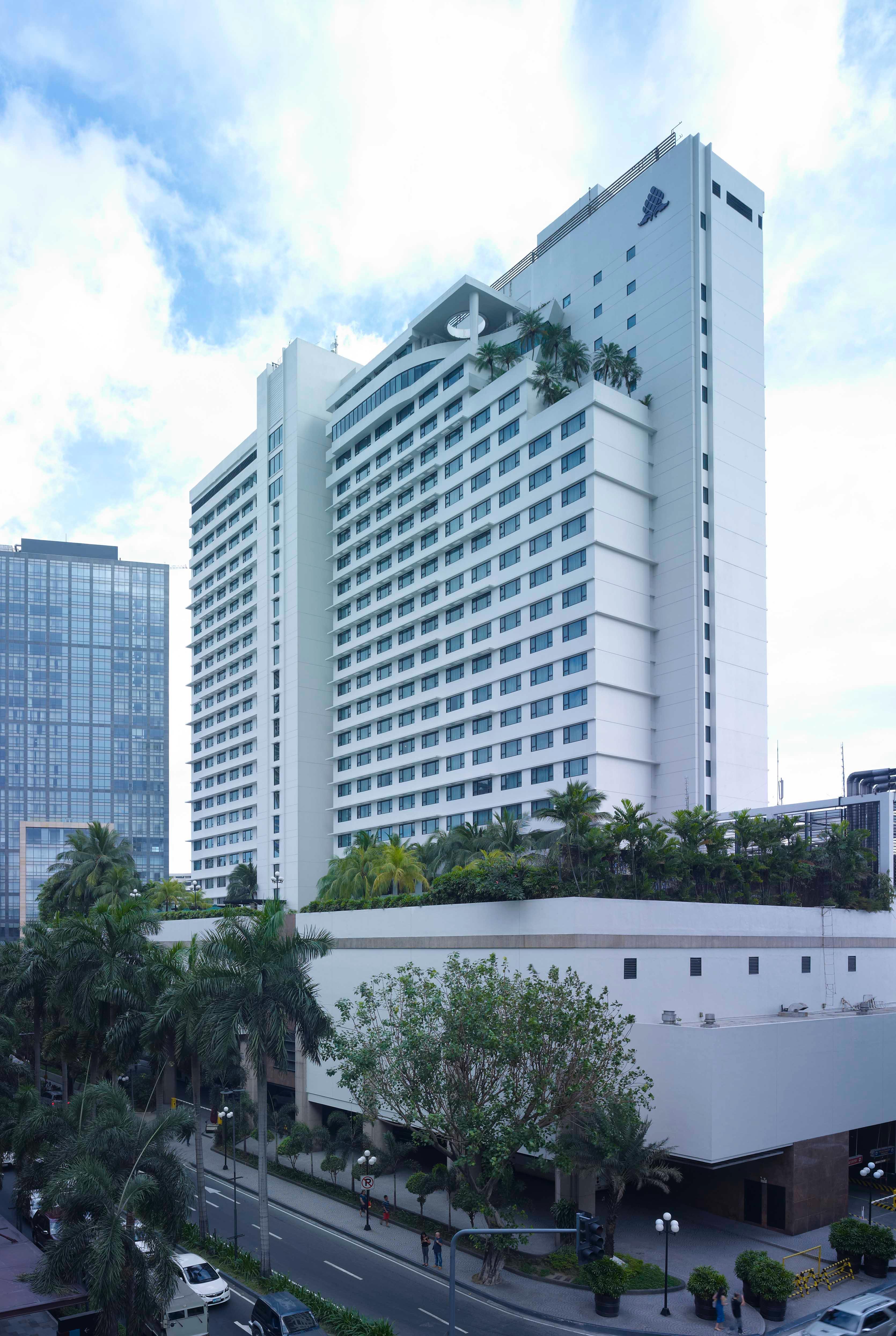 New World Makati Hotel, Manila Makati City Exterior photo The hotel in 2012